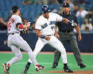 Jose getting picked off first base on 6/2/98 (CP Photo) 