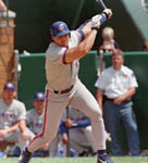 Jose singling during the Hall of Fame exhibition game on 7/27/98 (AP) 