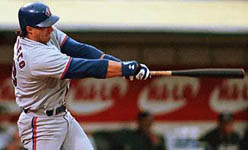 Jose taking a cut in Oakland on 8/17/98 (AP)