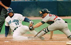Jose sliding safely into home on 9/4/98 (CP)