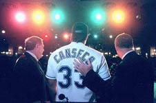 Jose in his new uniform at the press conference on 12/10/98 (SP Times)