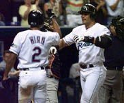 Randy Winn congratulates Jose after homer #8 on 4/21/99 (AP)