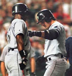 Jose steps on home plate after homer #15 on 5/18/99 (AP) 