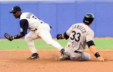 Jose is forced out at second in the first inning on 6/14/99 (AP)