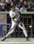 An off-balance Jose homering in Chicago on 6/14/99 (AP)