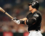 Jose watching a homer off of David Wells leave the park on 6/25/99 (AP)