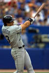 Jose watching homer #29 in Toronto on his 35th birthday - 7/2/99 (AP)