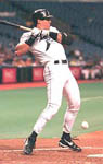 Jose jumping out of the way of an inside pitch on 8/25/99 (SP Times)