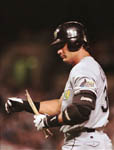 Jose checking out his broken bat after popping out on 9/1/99 (AP)