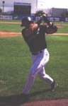 Jose finishing a practice swing right in front of the camera