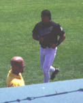 Jose jogging in front of the dugout