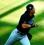 Jose running for a ball during BP